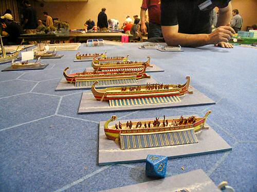 Liburnian, Triremes and Quadremes escort a group of Merchant Ships