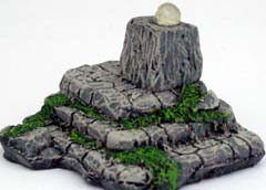 Crystal skull on stone plinth