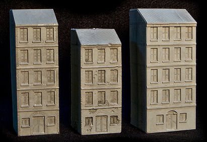 New buildings, shown primered and blackwashed to show details