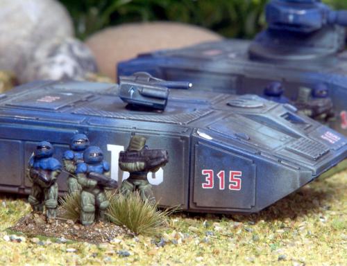 Terran Authority Star Marines (15mm GZG) deploy from an HSAG16 heavy grav/hov APC