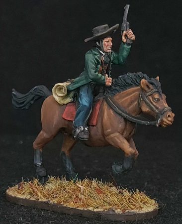 Texas Ranger in green, on horseback