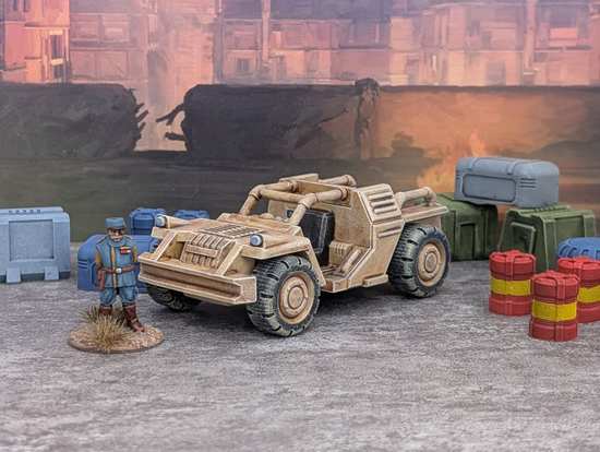 Image of a 28mm scale 4-wheel dune buggy surrounded by various barrels and boxes.