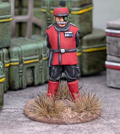 Image of a 28mm figure in red and black uniform