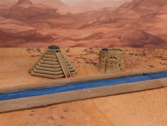 1:1000th scale Martian canal with a fortress and temple behind