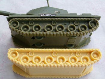 Treads and running gear from toy tank (top) were used in resin sci-fi tank (bottom)