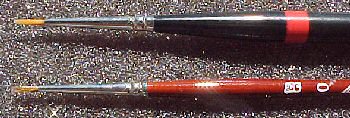 Large-handle (top) and narrow-handle brushes