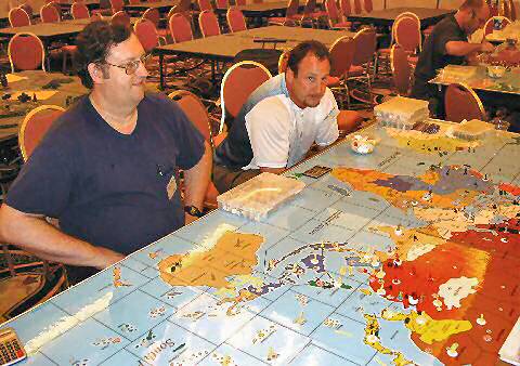 Norm and an opponent play a variant Axis & Allies game