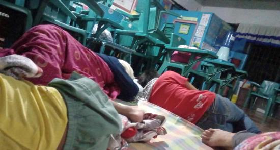 Gwen's family sleeping at the school