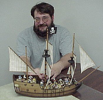 Brent Anderson posing with his latest product, the Pirate Ship