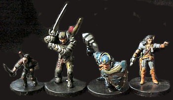 The Heroes (left to right): Lidda (Halfling Rogue), Regdar (Human Fighter), Eberk (Dwarf Cleric), and Aramil (Elf Sorcerer)