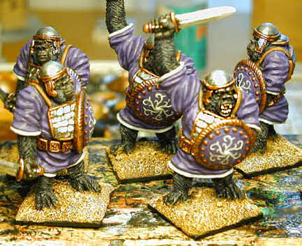 Figures with painted bases