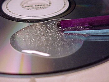 Mixed epoxy (and one of the many good usages for AOL CD's)