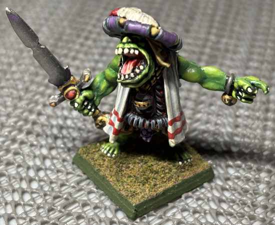 Close-up of Orc on shelf liner