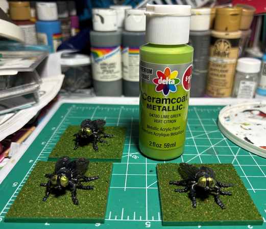 Flies with lime green metallic paint