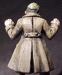 rear view of surrendering figure